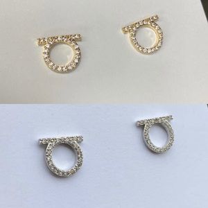 Ferragamo stud earrings 2 pairs